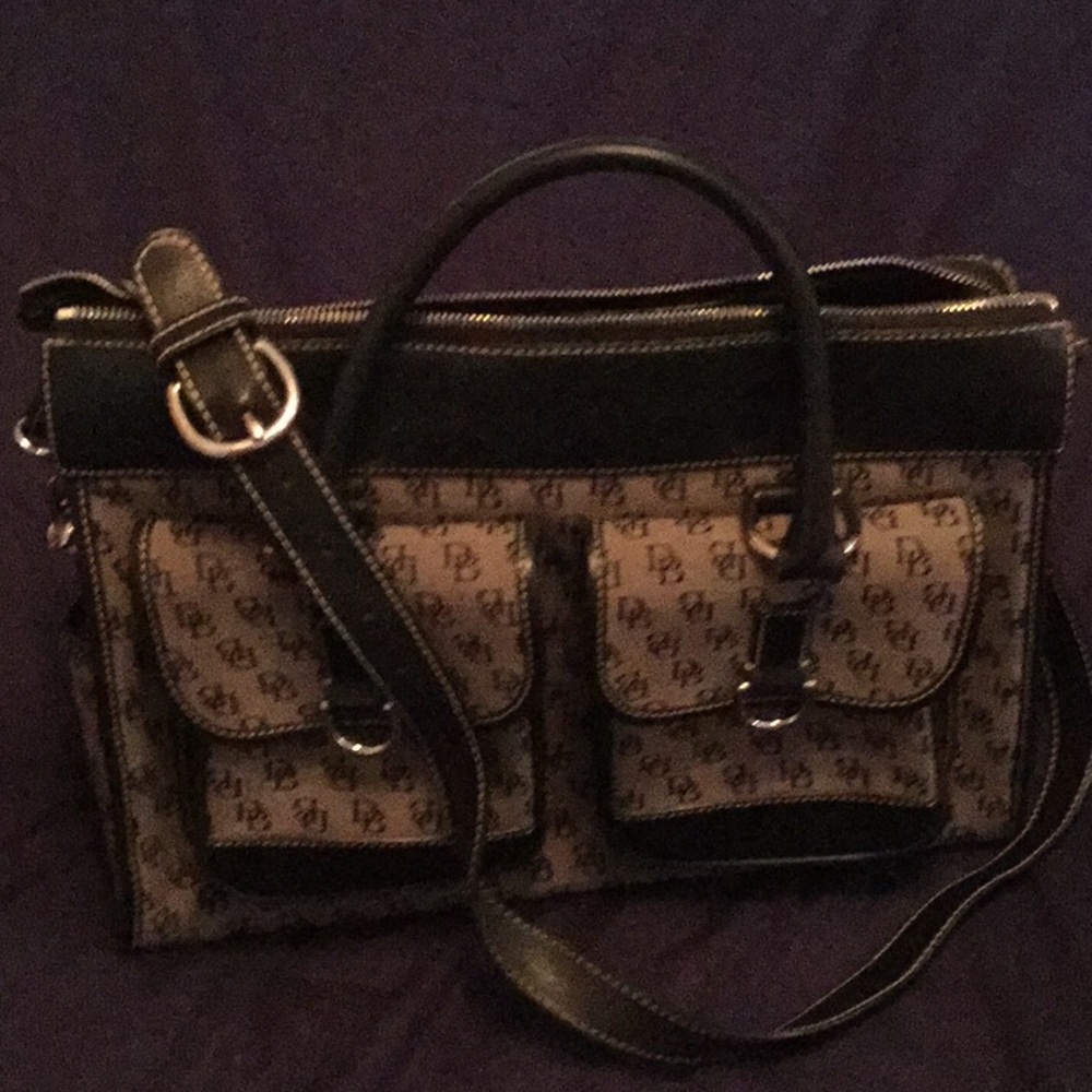 Dooney & Bourke Arm or Shoulder Bag.